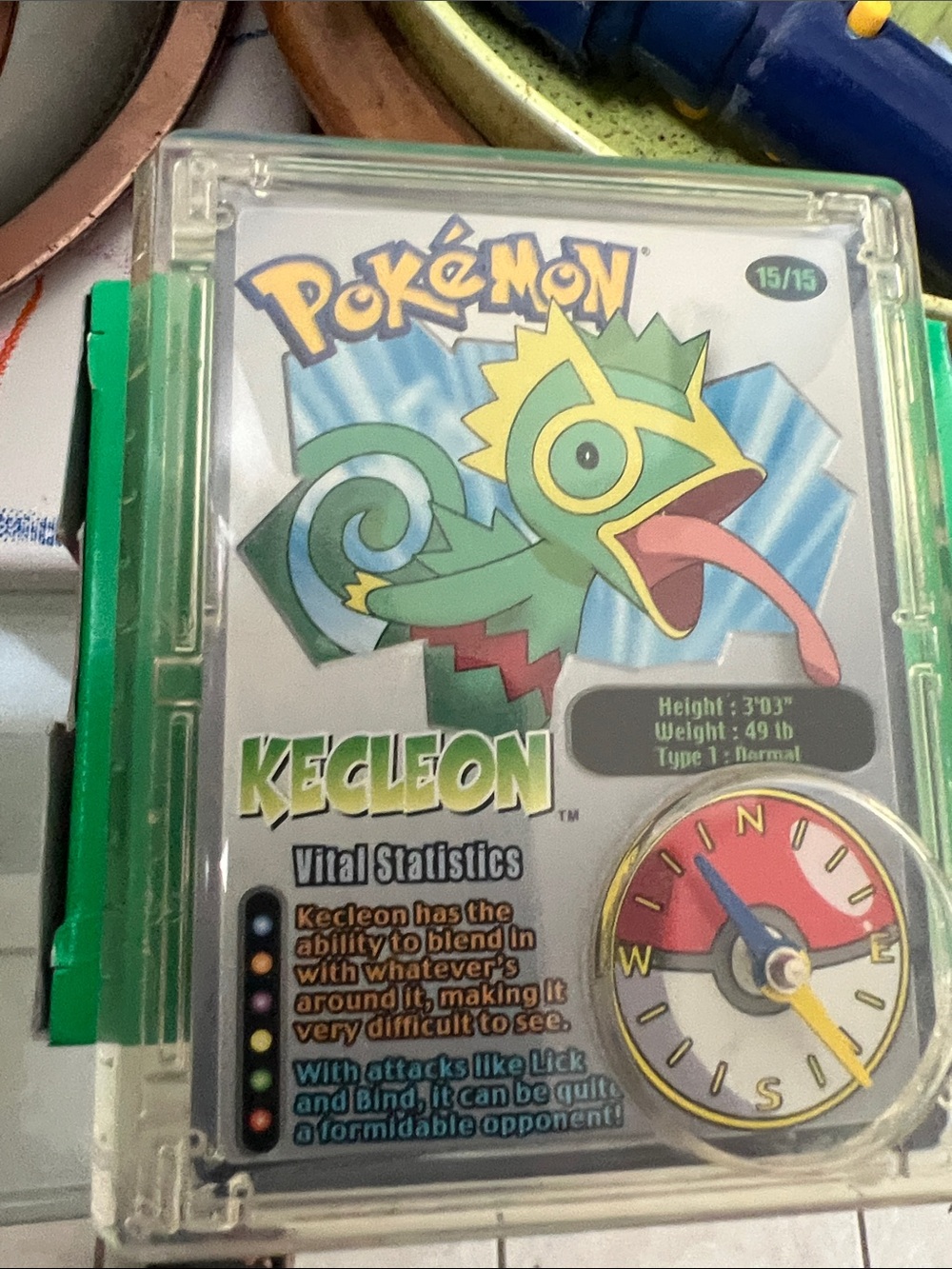 Pokemon Kecleon Trading Card with Green, Yellow, Pink, Blue Accents